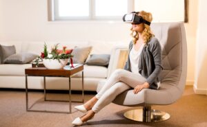 Photo of a young woman undergoing virtual reality therapy at the office of Ginny Estupinian, PhD.