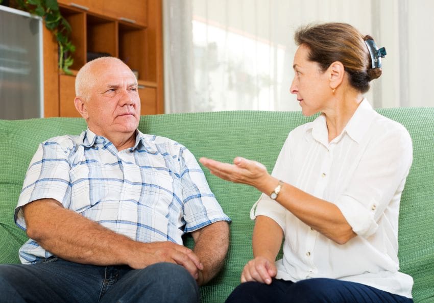Older couple having a difficult conversation