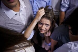 Photo of a woman suffering from a panic attack. Dr. Ginny Estupinian treats panic attacks and general anxiety disorders.