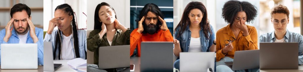 Diverse male and female professionals working on laptops under stress, illustrating workplace overload addressed through lbusiness consulting by Ginny Estupinian, PhD